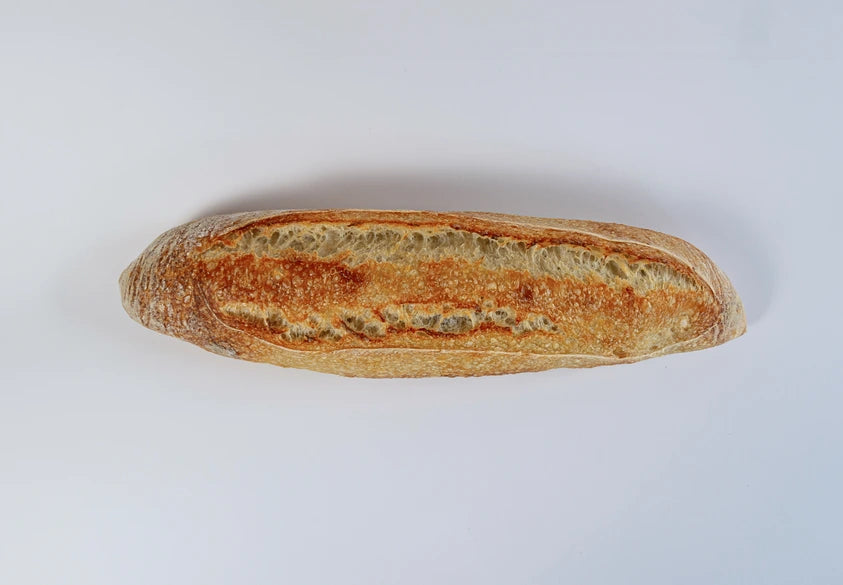 Traditional sourdough baguette baked