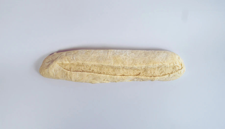 Frozen proofed traditional sourdough baguette