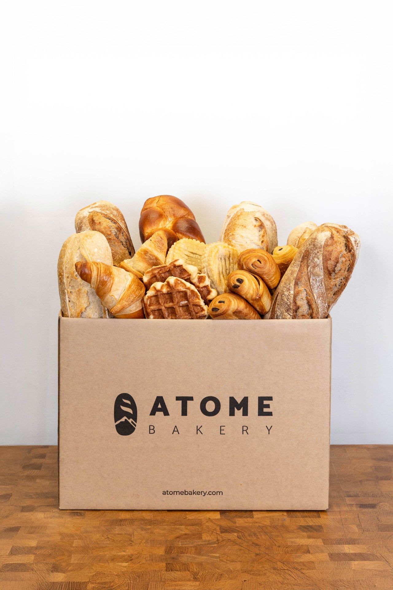An Atome box with sourdough and pastries